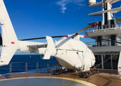 Helicopter on superyacht with full cover set